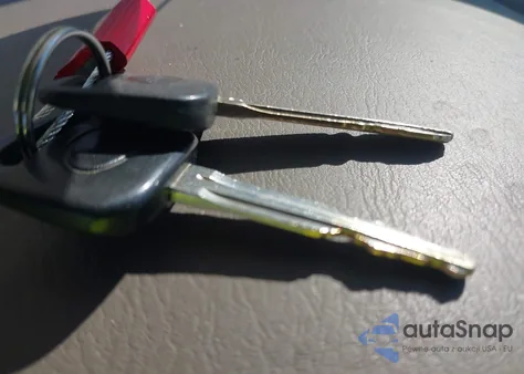 1999 Toyota Corolla Ce z USA, uszkodzony, nr VIN 1NXBR12E2XZ164958